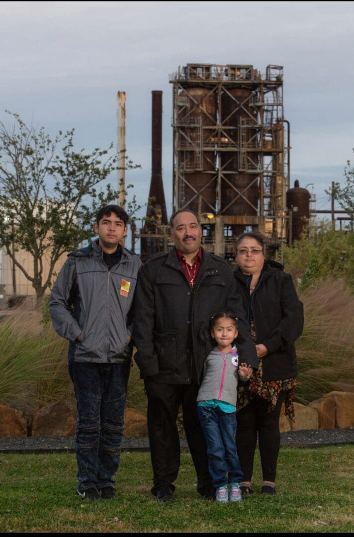 Juan Flores, his wife Maria, and children Dominique and Jean at their home near the Houston Ship Channel in Texas. (photo supplied by family)