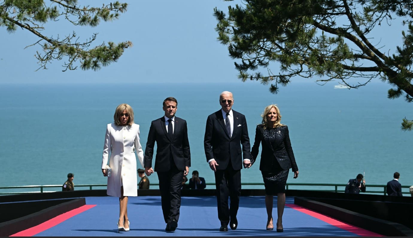 President Biden marking D-Day alongside President Macron in France.