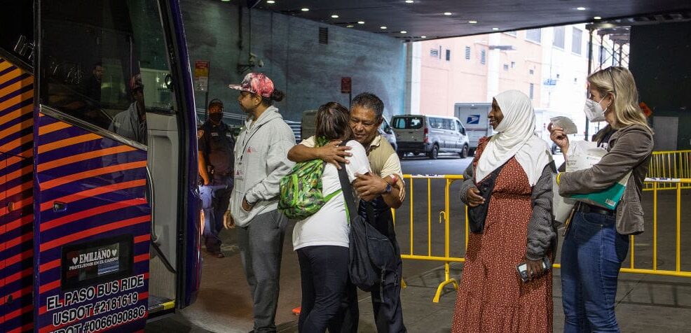 NEW YORK, NEW YORK - SEPTEMBER 25: Buses of migrants who have been detained at the Texas border continue to arrive in New York, September 25, 2022 at the Port Authority bus terminal in midtown New York City, New York. With the city shelter system full, the migrants are still receiving a warm welcome upon arrival even as New York Mayor Adams is considering a law suit against the state of Texas for continuing to send migrants unannounced. (Photo by Andrew Lichtenstein/Corbis via Getty Images)