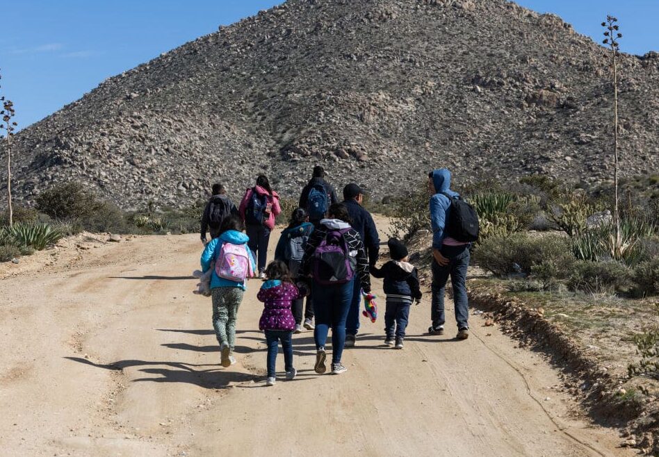 Migrants At The US-Mexico Border