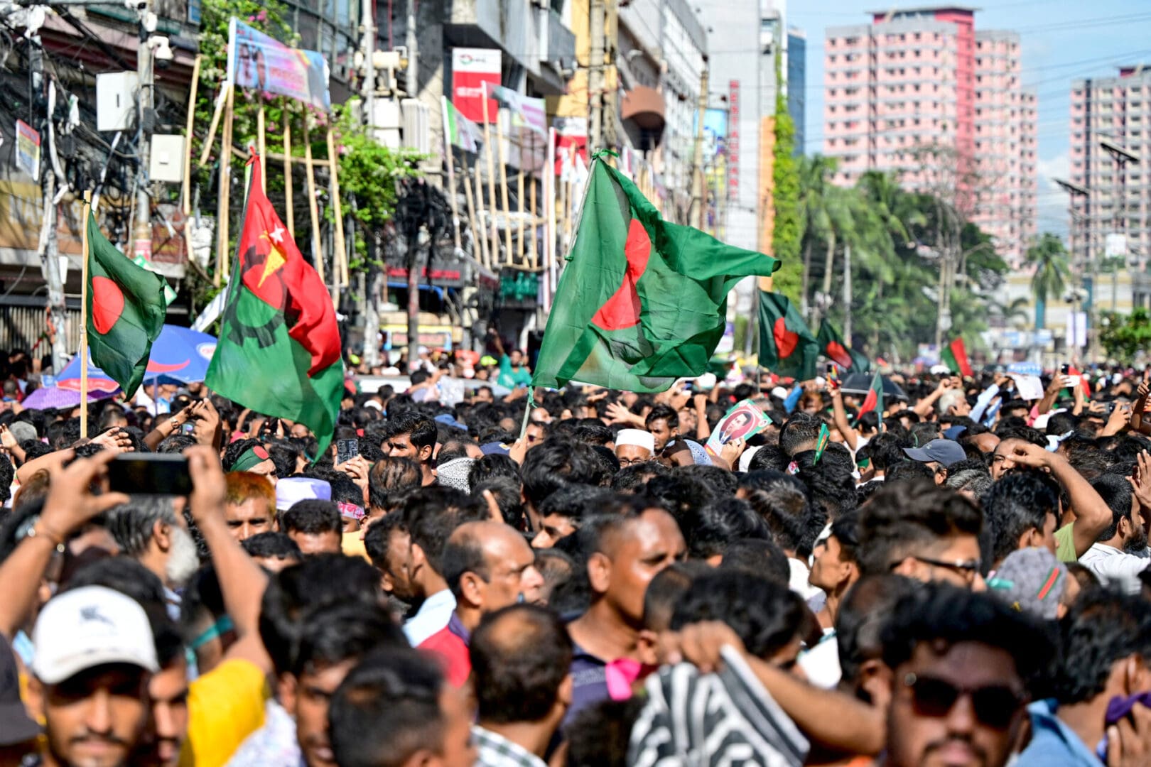 Bangladesh Nationalist Party (BNP) activists gather during a rally in Dhaka on August 7, 2024. Bangladesh's Muhammad Yunus, who is set to lead a caretaker government after mass protests ousted the premier, called on compatriots on August 7, to be 