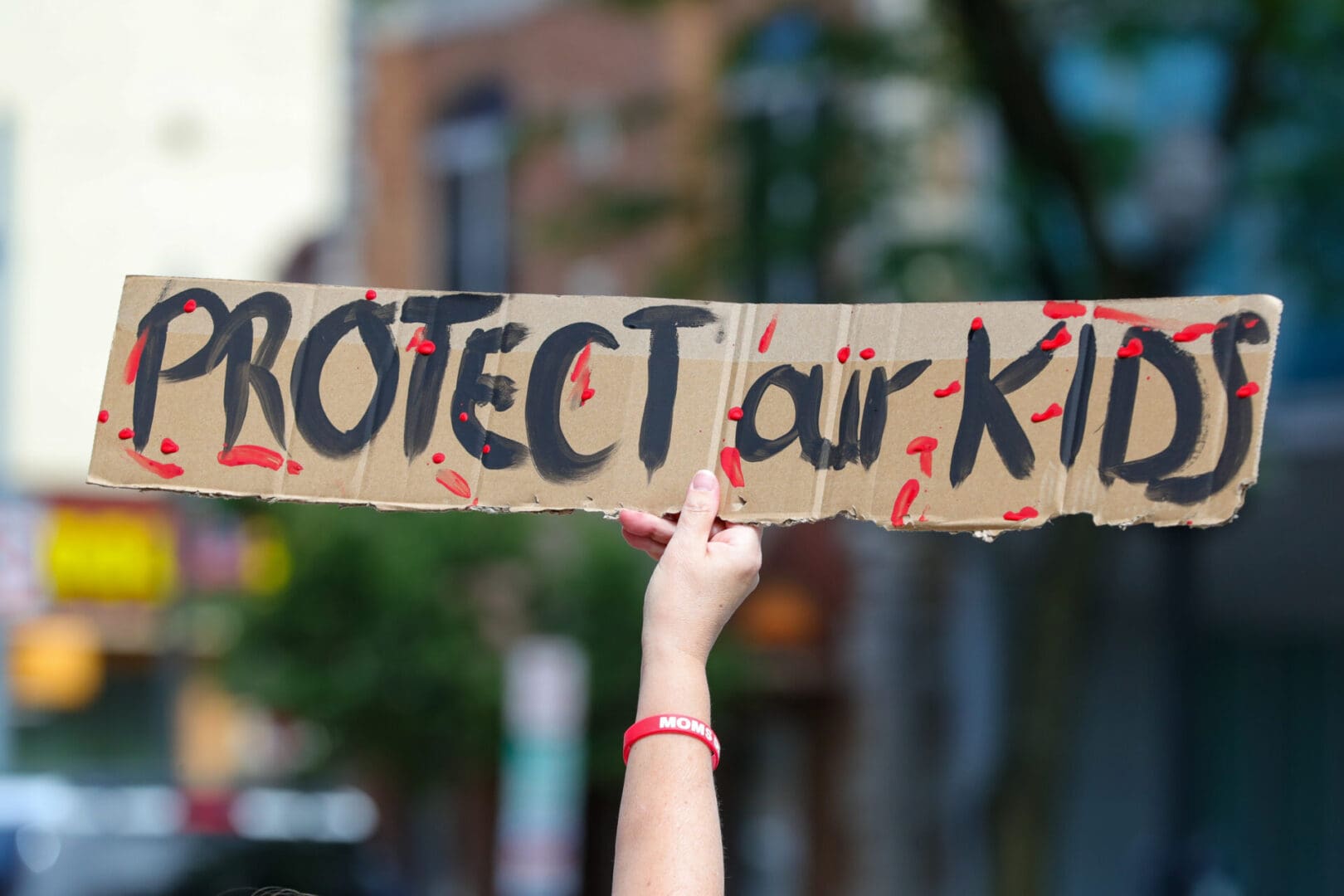 A protester holds a placard at a March for Our Lives rally