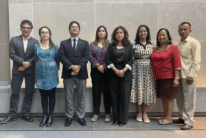 Delegation from Ecuador and Amnesty International in front of building in DC